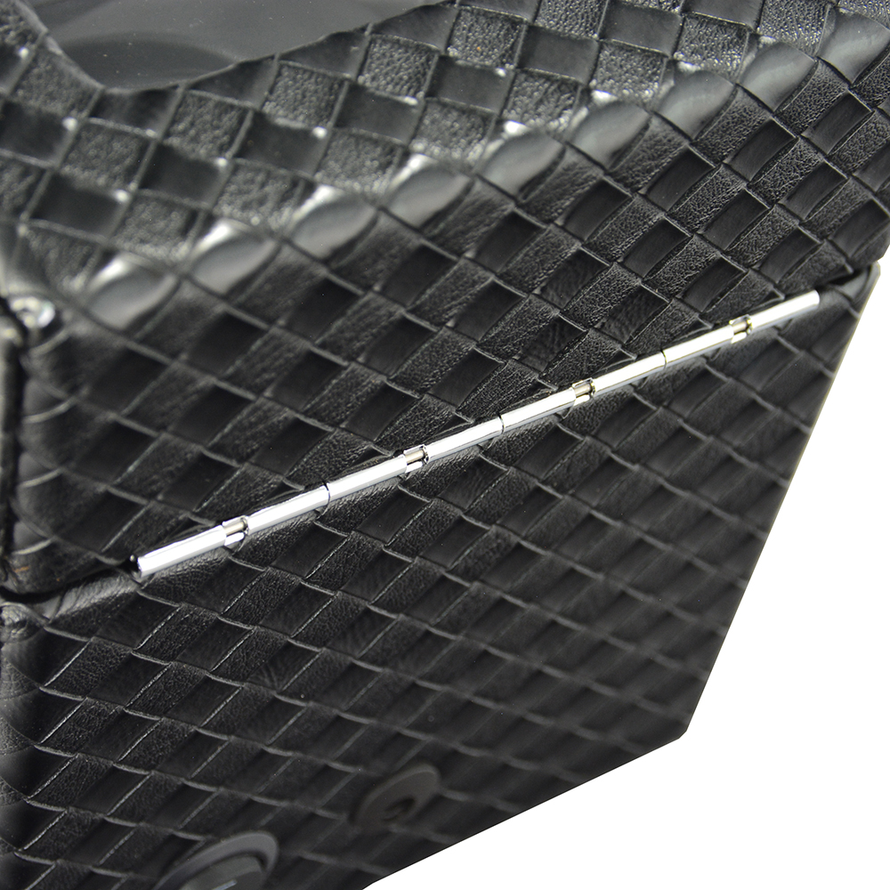 Close-up of single watch winder hinge and woven black PU leather exterior
