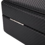 Carbon fiber watch case with organized interior compartments and watch cushions